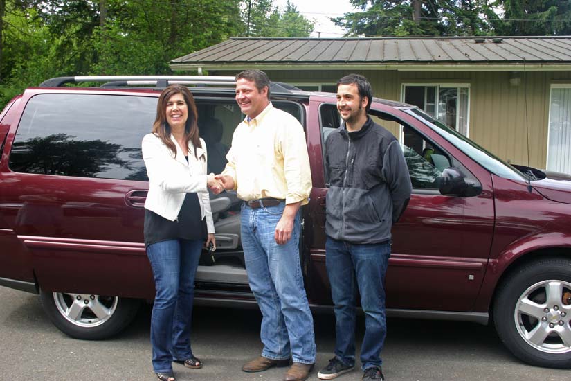 Image: Councilmember Reagan Dunn is joined by Michelle Frets, Director of Programs and Case Manager Kyle Serquinia for the delivery of a surplus County Vanpool Van to the agency