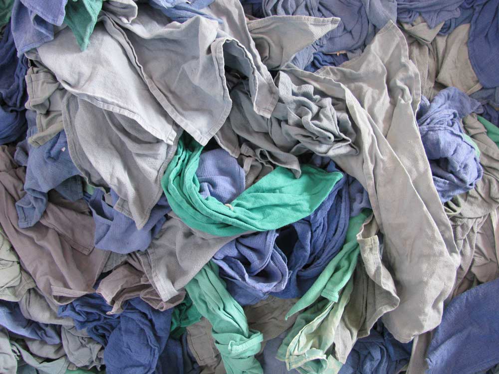 Some damaged clothes and linens are converted into industrial wiping rags