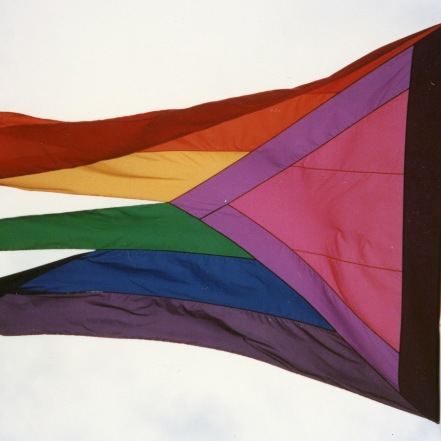 Rainbow pride flag against skyline