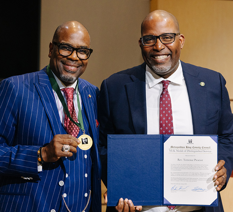 Reverend Terrence Proctor with Councilmember De’Sean Quinn.