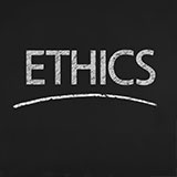 Ethics written on a chalkboard.