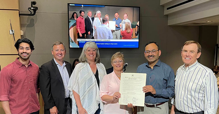 Councilmembers Dembowski, Balducci, Perry, and von Reichbauer pose with community members after presenting the American Muslim Holidays Recognition.