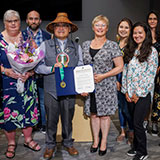 Councilmember Perry awards MLK medal to Tribal Chairman Robert de los Angeles.