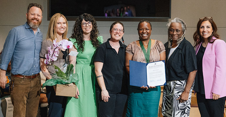 Makini Howell, District 8 recipient, with family and CM Mosqueda.