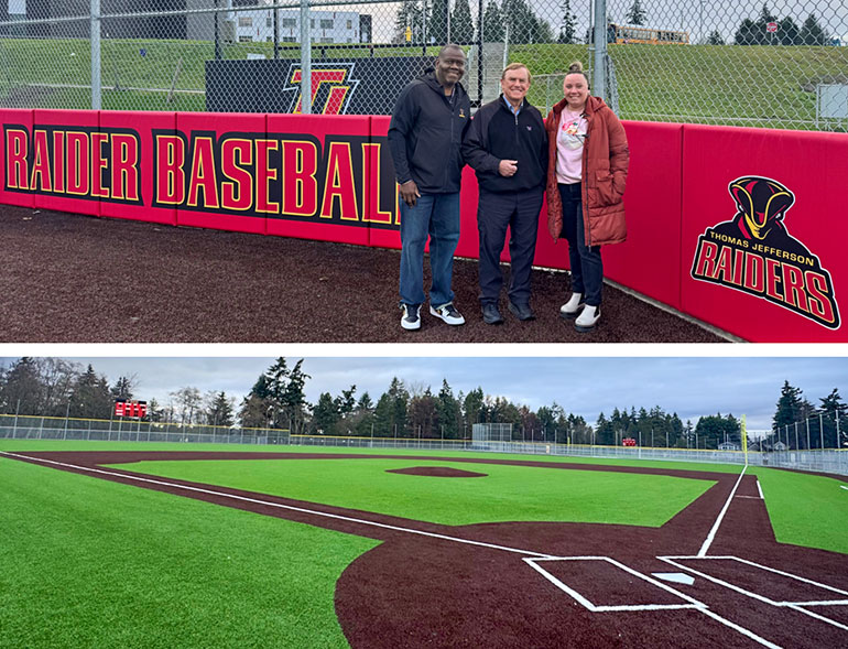 Group in front of Raider Baseball sign and empty baseball field.