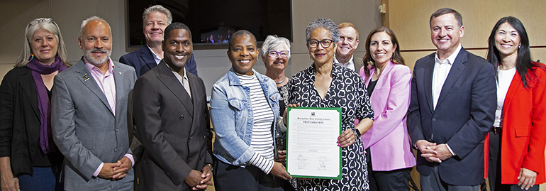 King County Councilmembers with Northwest African American Museum representatives receiving the proclamation document.