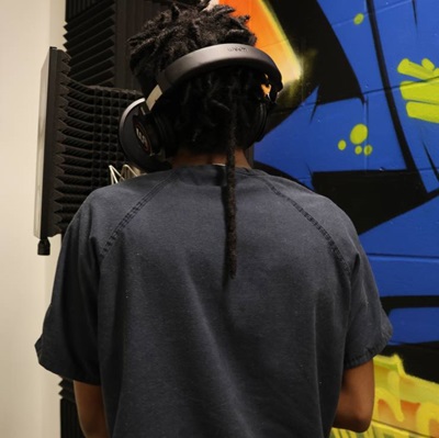 A youth participates in music programs from Cocreative Culture at the Clark Children and Family Justice Center in Seattle.