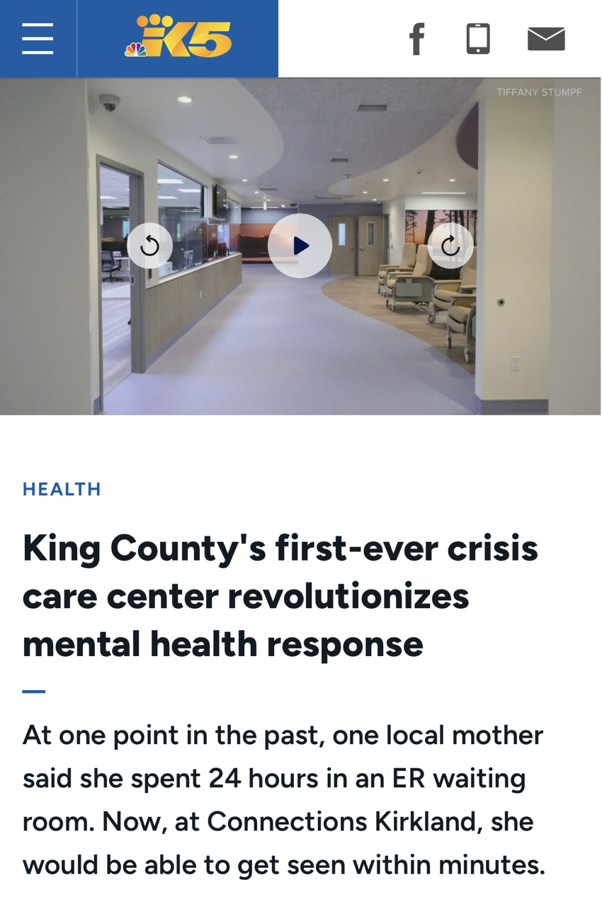 Screenshot of online King5 article titled - King County's first-ever crisis care center revolutionizes mental health response. It includes a picture of the interior of a treatment area at Connections Kirkland.
