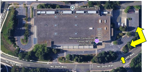 Aerial image of building 33 indicating with yellow arrows where the above ground parking is for the building