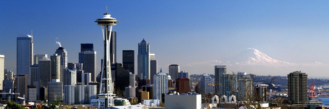 The Seattle city skyline, including the Space Needle and Mount Rainier