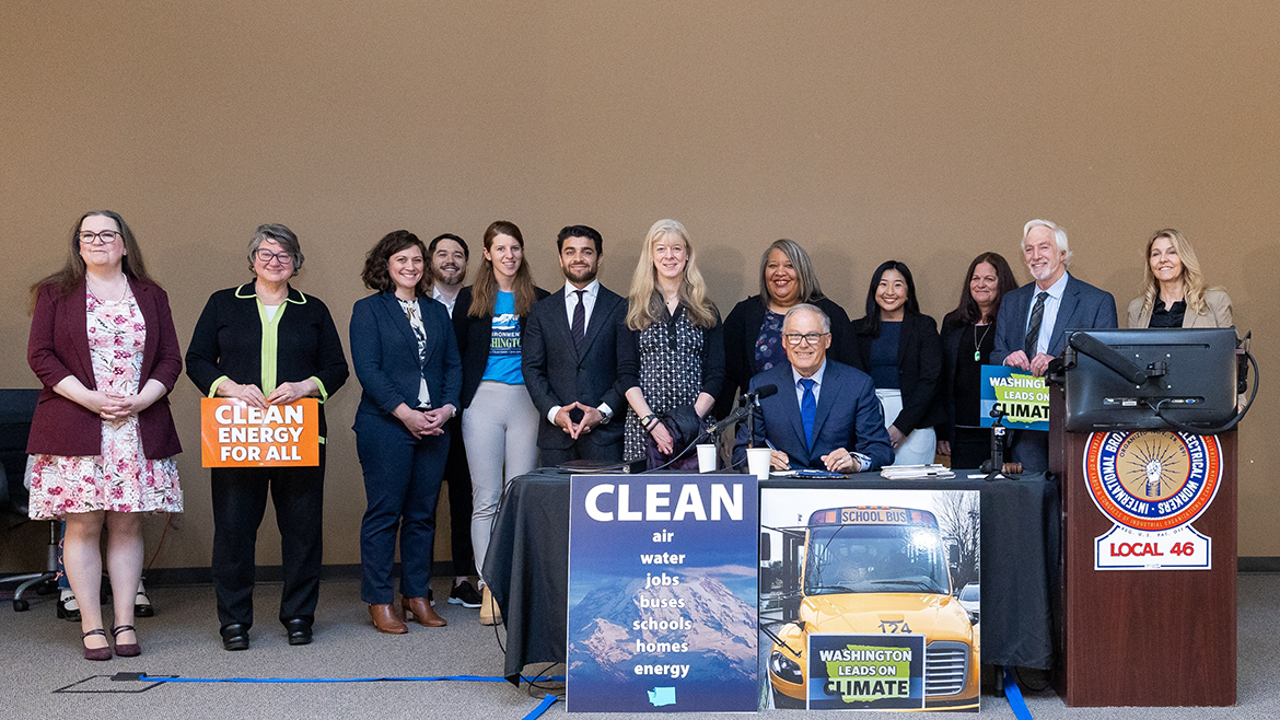Governor Inslee signing the lead cookware bill into law