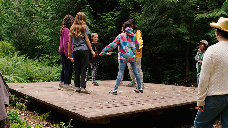 Kids playing a teambuilding game at Camp Sealth