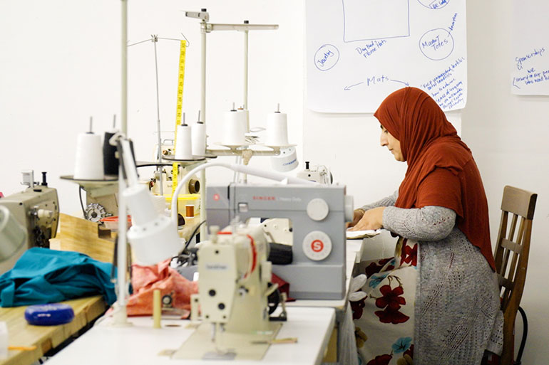 Woman working at a sewing machine