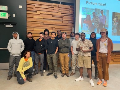 group of people posing for camera and smiling