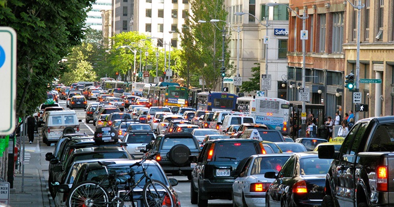 Heavy traffic on a downtown street.