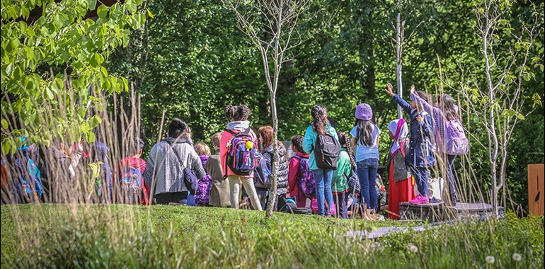 Children on a field trip visiting a park
