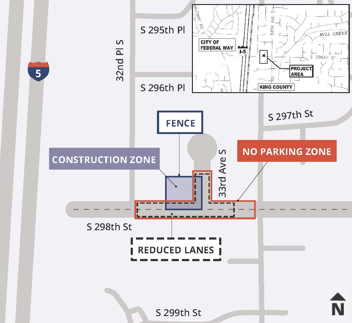 An aerial map of construction work around the southwest corner of S 298th Street and 33rd Ave S. There is a fence around the construction zone area and no parking outlined in red along S 298th St and 33rd Ave S adjacent to the construction zone. Reduced lanes are outlined in dashed lines S 298th Street and 33rd Ave S near the construction zone.