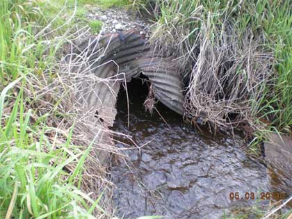 Crushed culvert opening