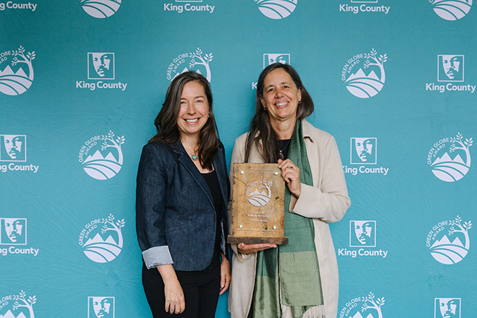 Charlotte Spang, a tireless, engaging advocate for native salmon, is honored with the Leader in Salmon Recovery Green Globe Award