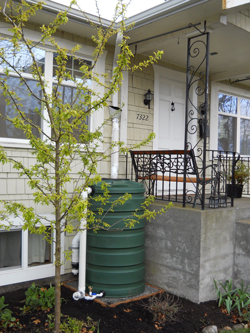 Cistern in front of a home porch