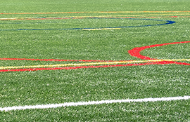 Many colored stripes cross on a multi-use field