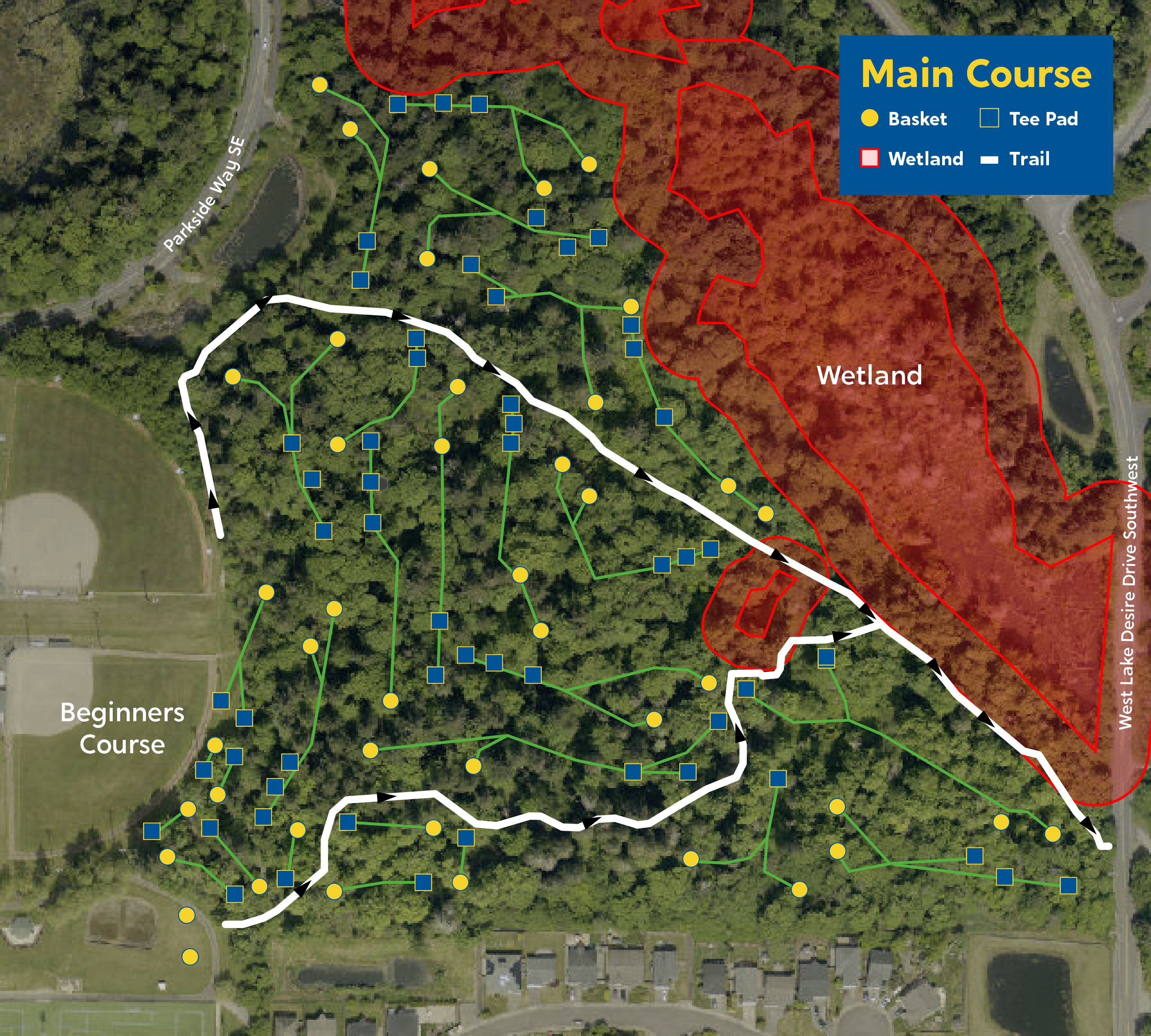 An aerial map of the disc golf locations in a wooded area, baseball diamonds are to the left and a red shaded area indicating a wetland with no holes/courses is to the right
