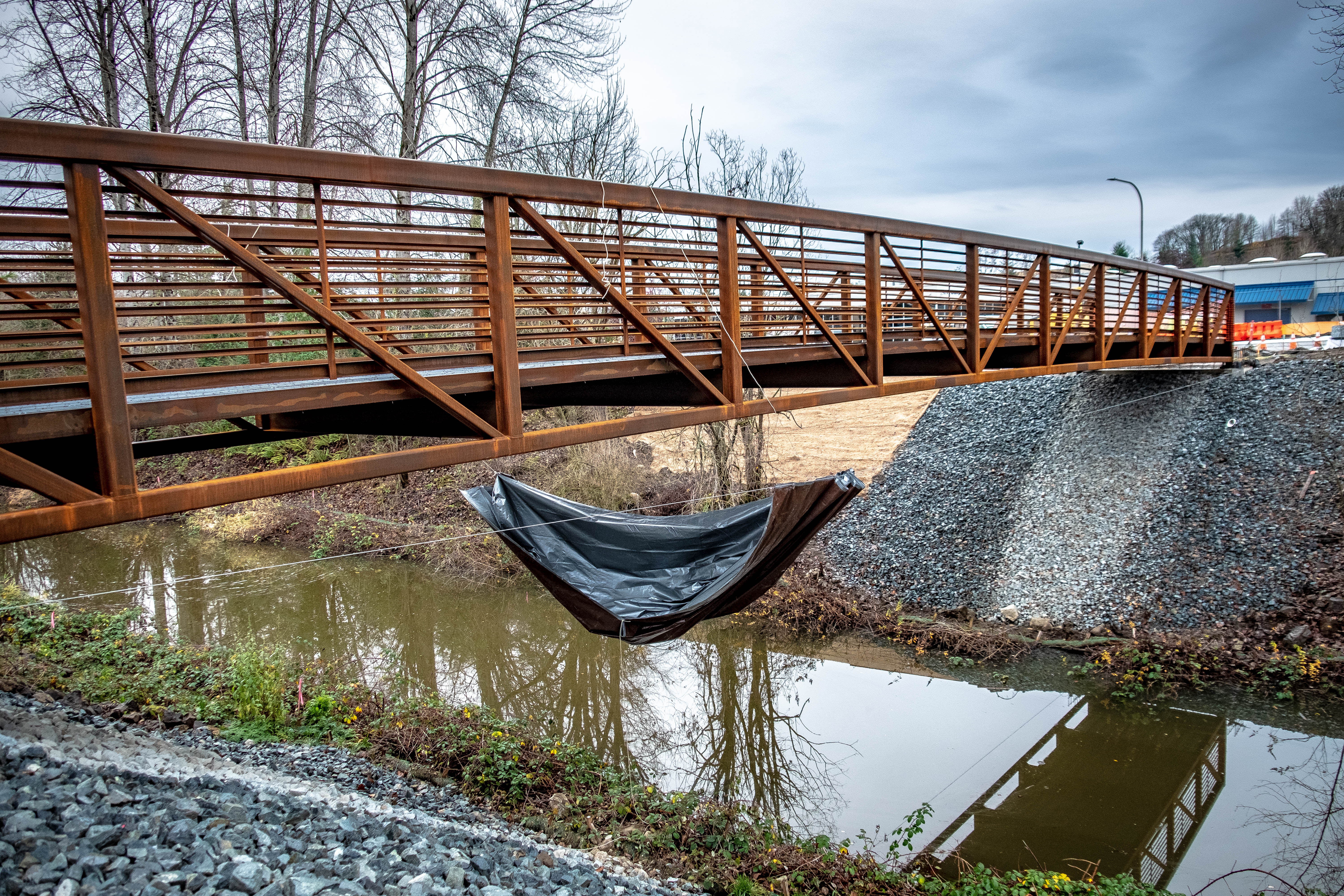 The bridge over the Black River along the Lake to Sound Trail insalled