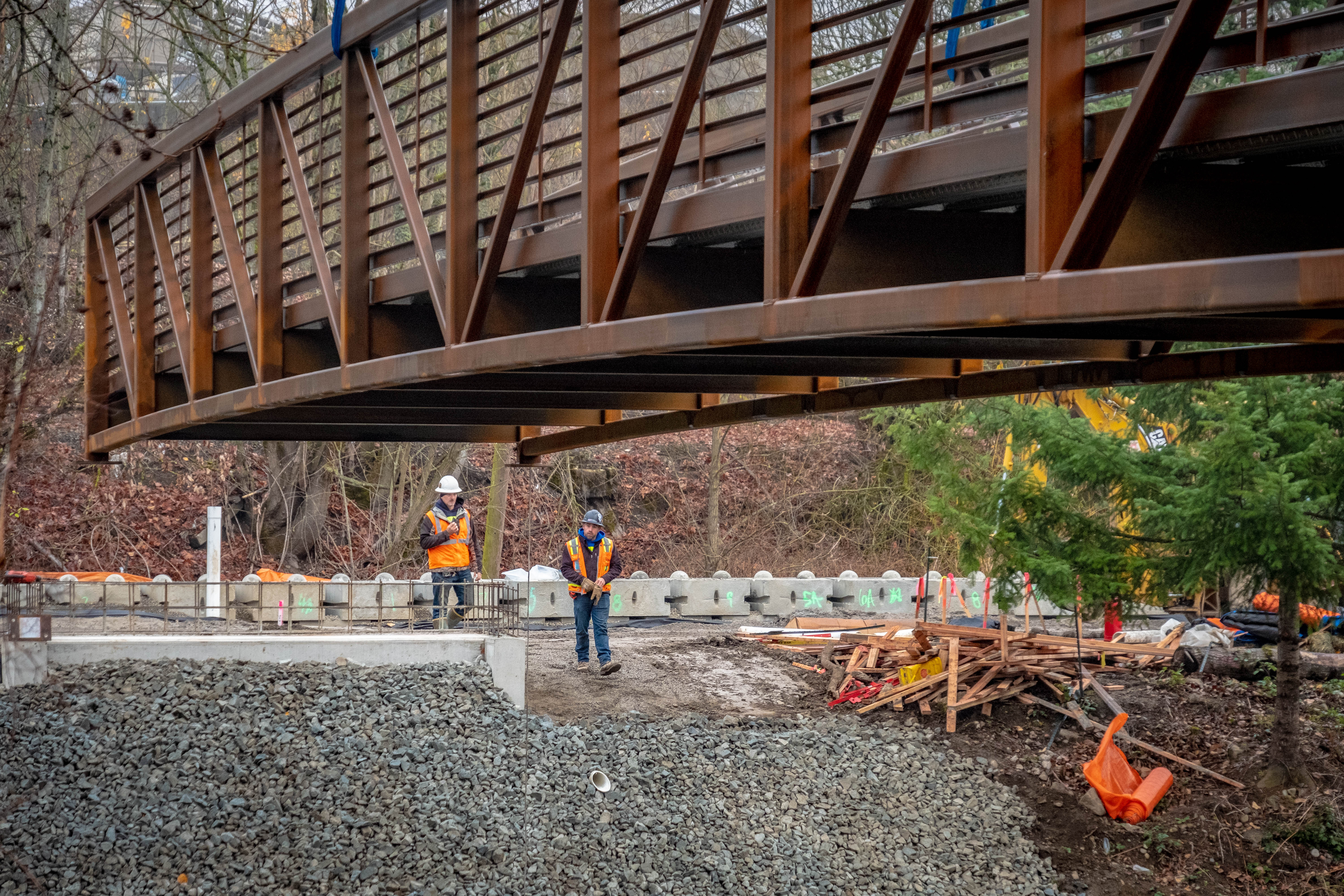 The Lake to Sound Trail bridge over the Black River getting craned into place