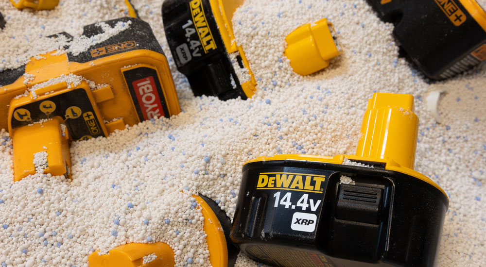 Image showing several power-drill batteries, packaged for shipping to a recycling facility