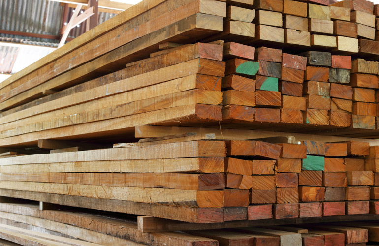 Image showing multiple stacks of salvaged 2'x4' lumber