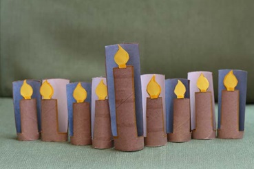 A menorah made from toilet paper rolls and construction paper