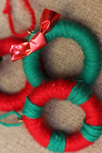 Festive ornament made from string, ribbon, and shower rings