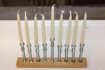 A menorah made from recycled materials