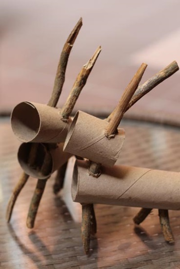 Eco-tastic table decoration - toilet paper roll and twig reindeer