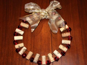 Holiday wreath made from wine corks and jingle bells.