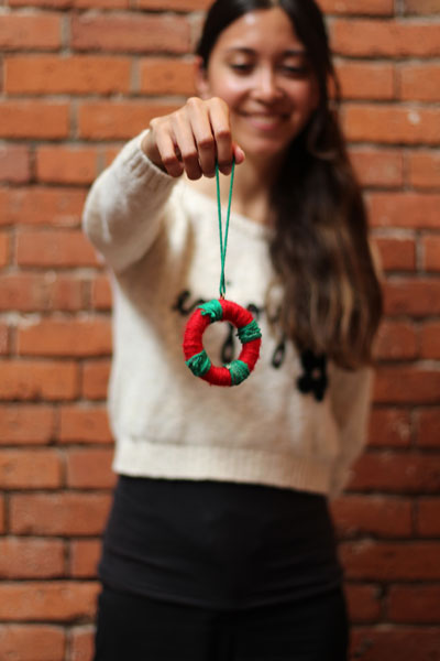 Girl holding an eco-tastic ornament