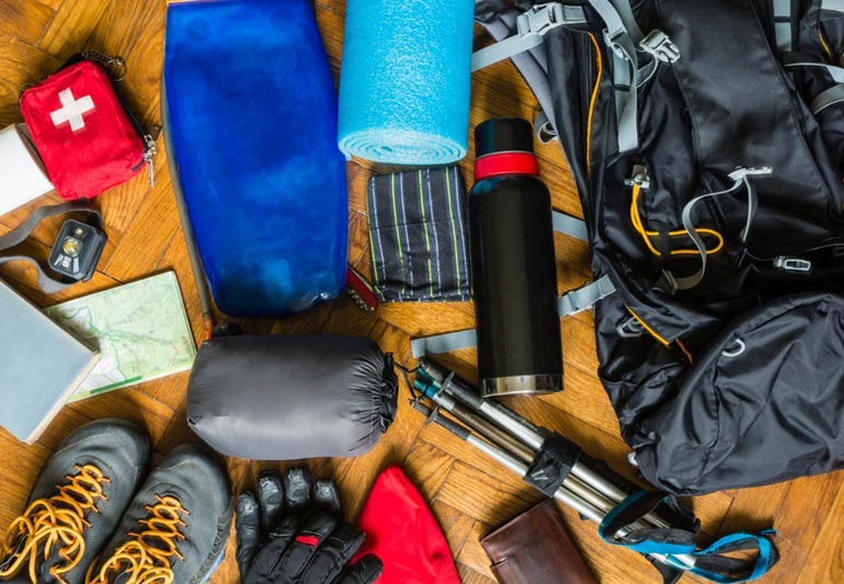 overhead image of various outdoor gear items