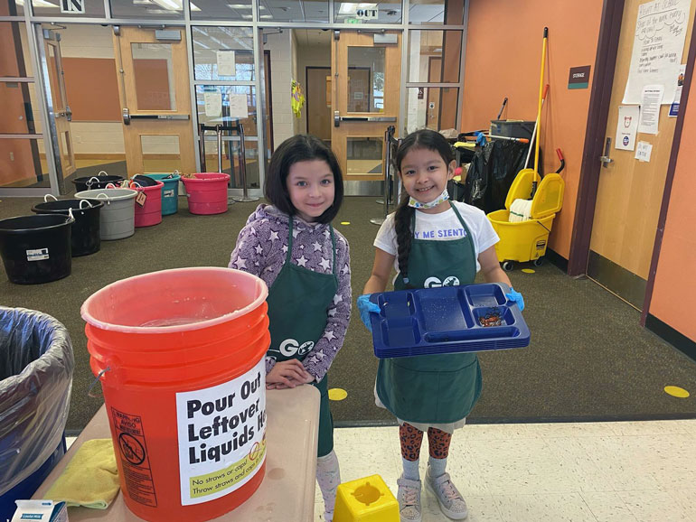 Students at Honey Dew Elementary in Renton helped at cafeteria sorting station