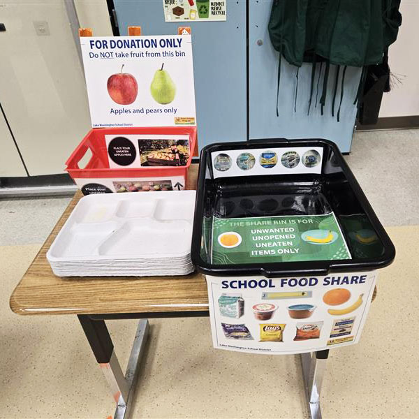Many schools have share tables and donation bins to make sure as much food as possible is eaten. This set-up is at Albert Einstein Elementary School.