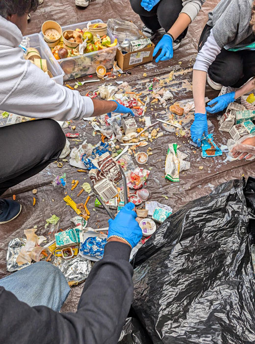 Image showing students at Auburn High School conducting a cafeteria waste audit.