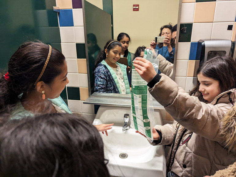 Students at Audubon Elementary School work on a water flow project