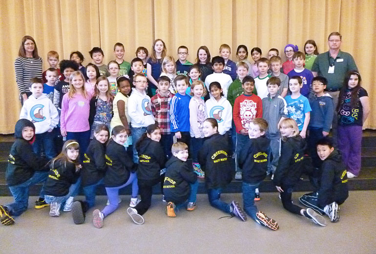 Students from Creekside Elementary school in Issaquah show off their Waste Watcher hoodies
