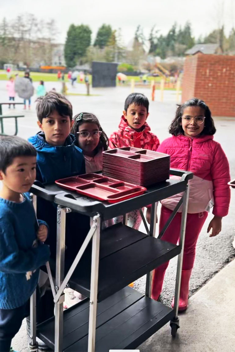 Redmond Elementary School students volunteer as lunch monitors to help increase recycling and reduce waste
