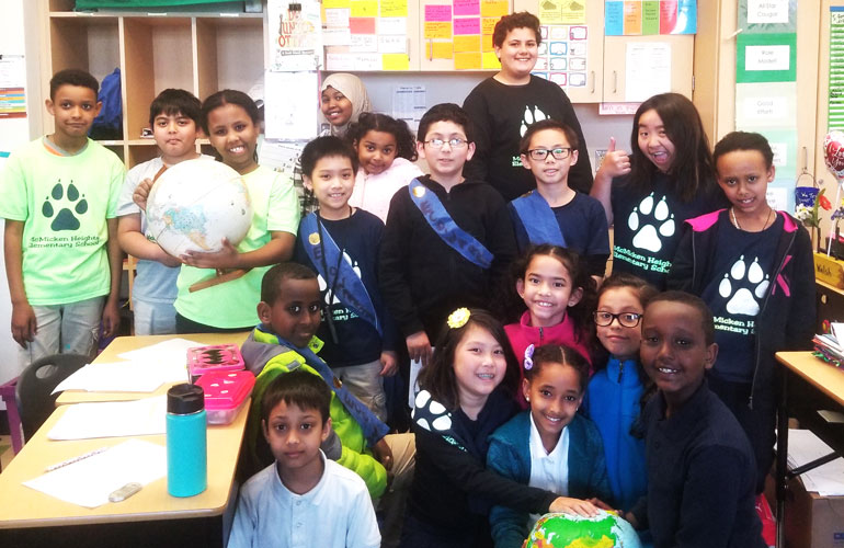 The Eco-Warrior student team at McMicken Heights Elementary School celebrates its energy conservation efforts