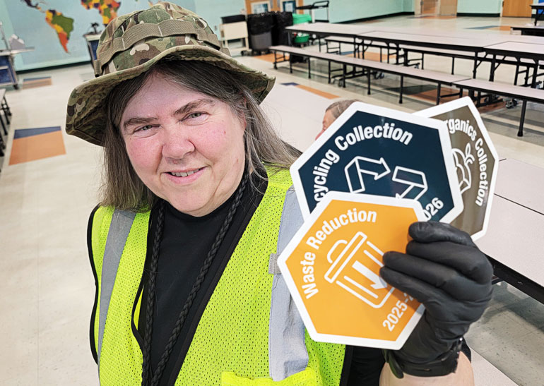 Theresa Cassell, lead custodian at Thorndyke Elementary School, helps her school collect organics and recyclables and maintain low contamination in the bins throughout the school.