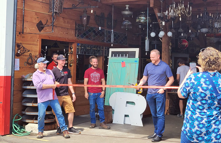 Image showing the ribbon-cutting ceremony at Earthwise Architectural Salvage's Kenmore location