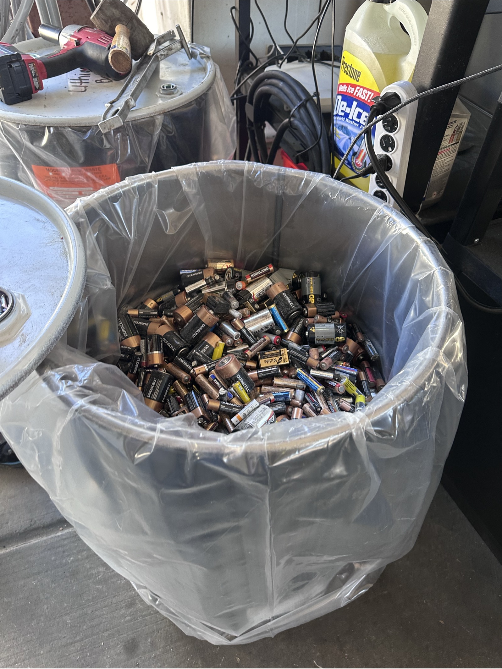 Drum full of disposable batteries at South Seattle hazardous waste facility.