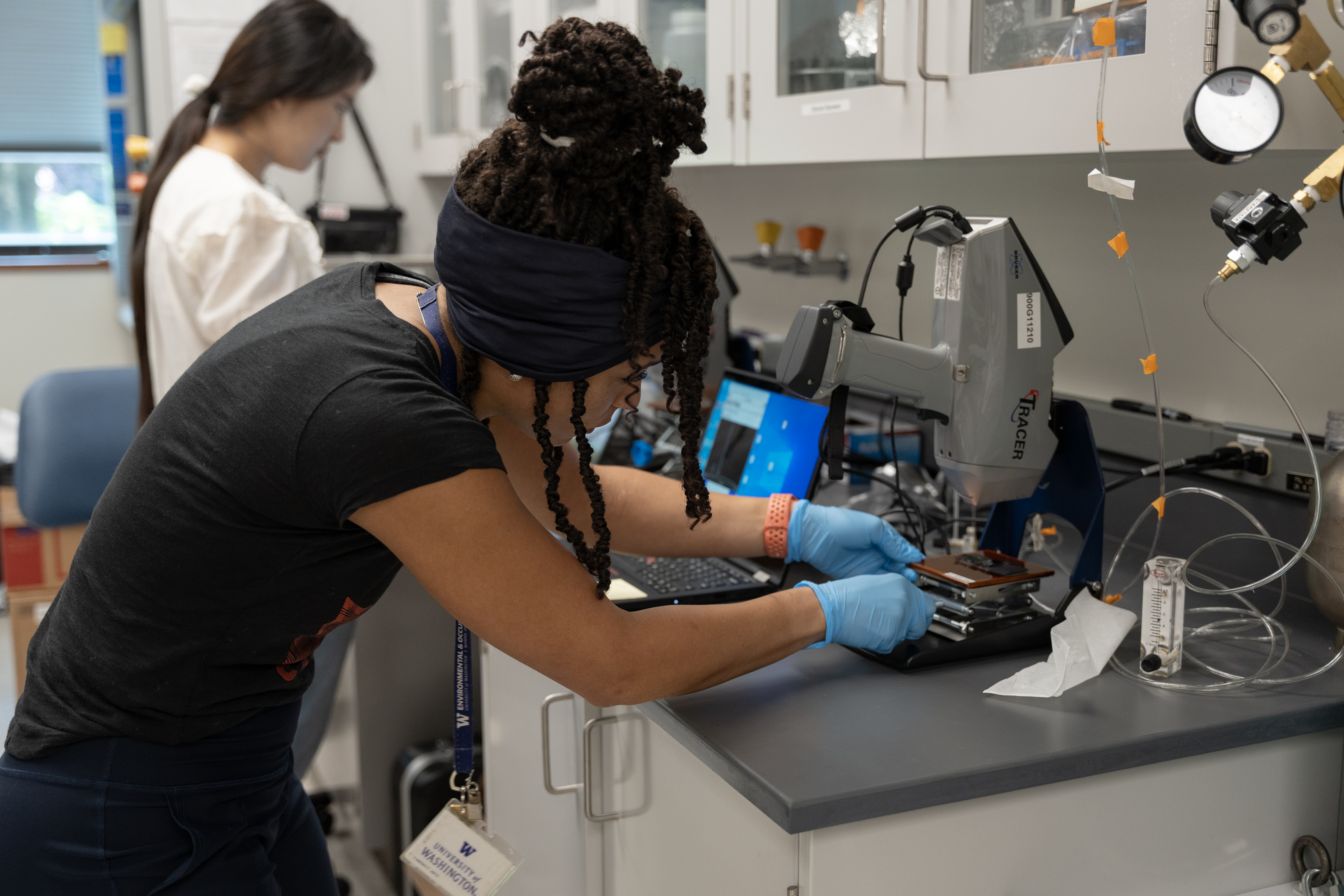 Researcher uses XRF machine to test for PFAS