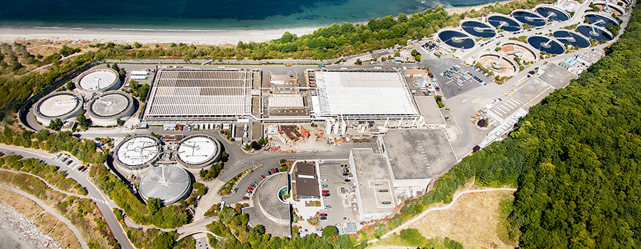 Aerial photo of West Point Treatment Plant on the shores of Puget Sound.