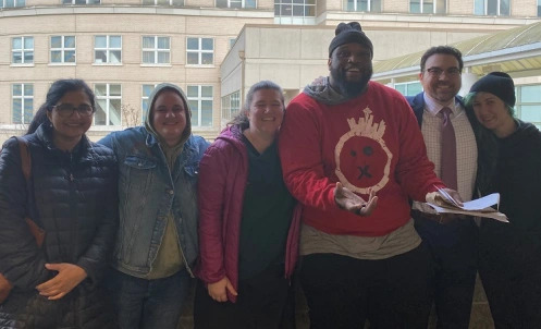 Dre Glaspy with his defense team (from left to right): Anna Samuel, Emily Willard, Alix Willard, Dre Glaspy, Michael Schueler, and Molly Gilbert